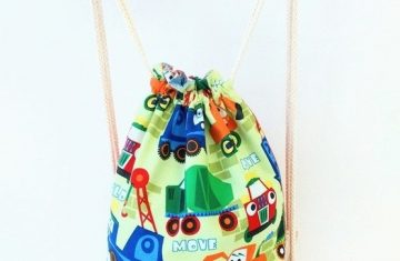 Mochila reversible grúa naranja hecha a mano