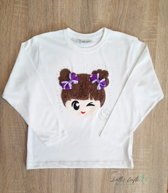 Camiseta manga larga muñeca cara con lazos