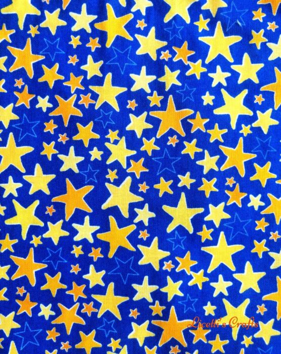 Tejido algodón americano estrellas amarilla y naranja fondo azulón