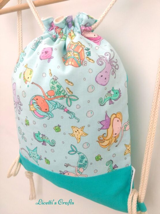 detalle mochila cuerdas forro algodón diseño sirenas