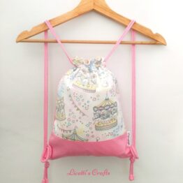 mochila cuerdas tejido tiovivo unicornios rosa