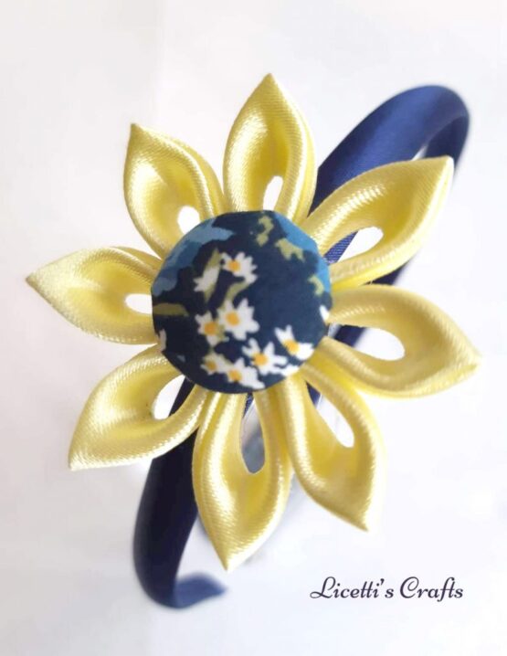 Diadema infantil "Pétalos amarillos botón margaritas"