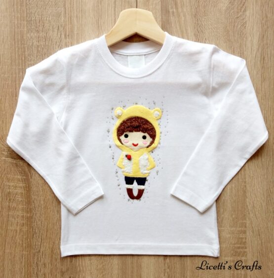camiseta manga larga con figura en relieve