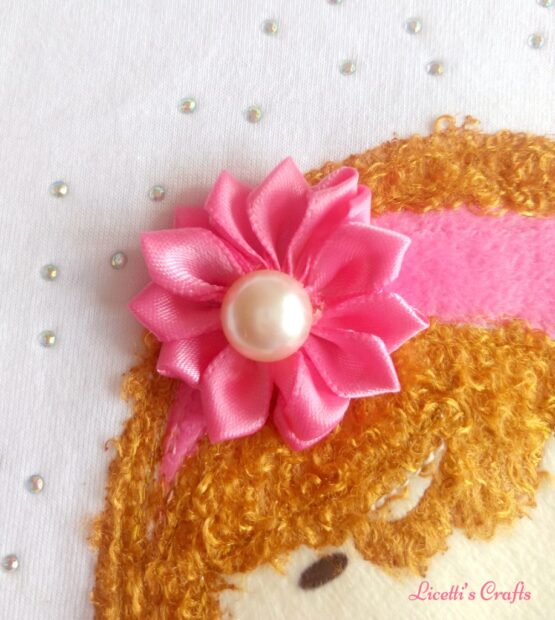 detalle flor muñeca para camiseta hecha a mano