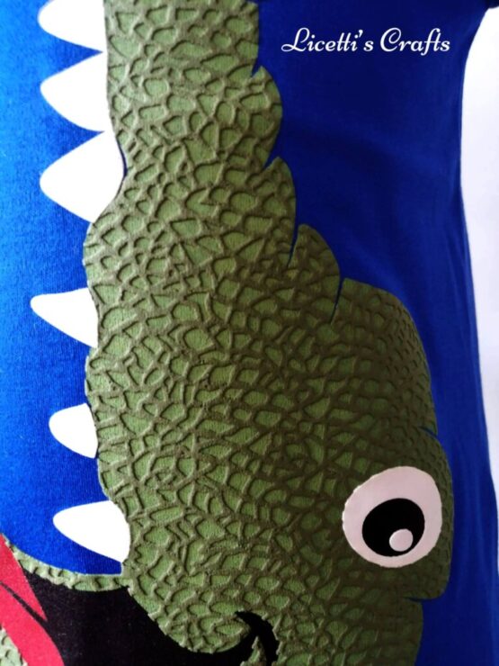Detalle escama camiseta cocodrilo