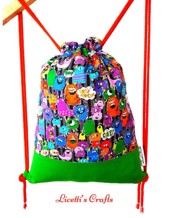 mochila cordon ajustable monstruos multicolor