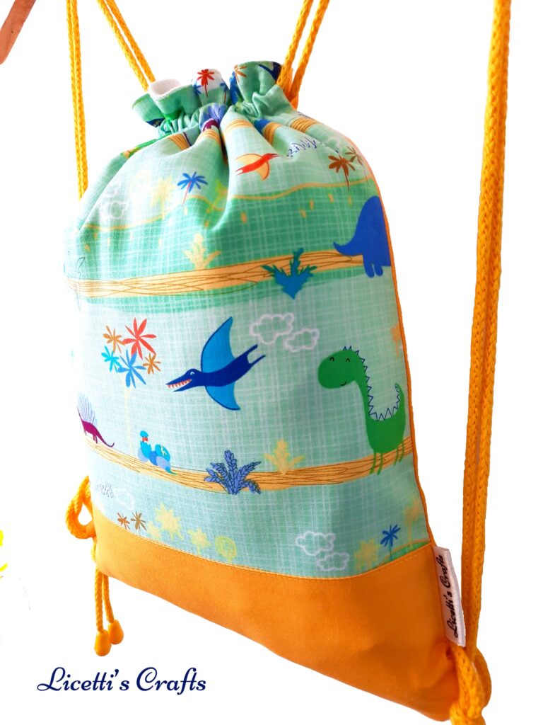 mochila cuerdas infantil dinosaurio divertido