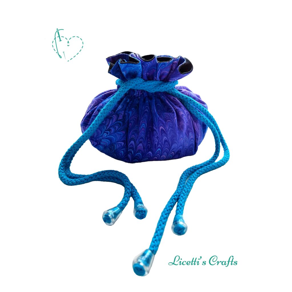 bolsa de dados fantasía tejido plumas