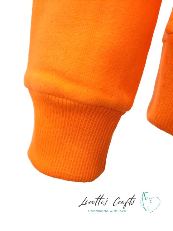 Puño sudadera naranja