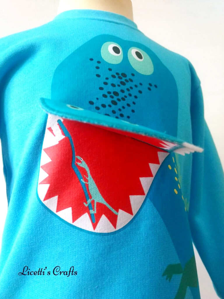 Sudadera dinosaurio dientes limpios