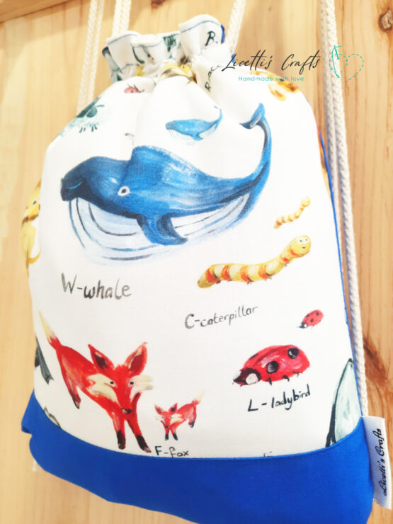 Detalle Mochila animales Ballena Zorro Mariquita
