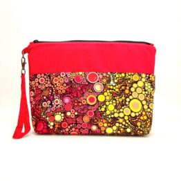 Bolso de mano clutch esferas rojas y amarillas