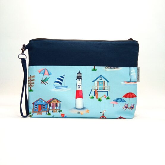 Bolso de mano clutch faros y escena playa