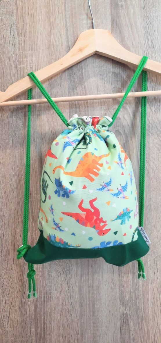 mochila cuerdas tela dinosaurios verde