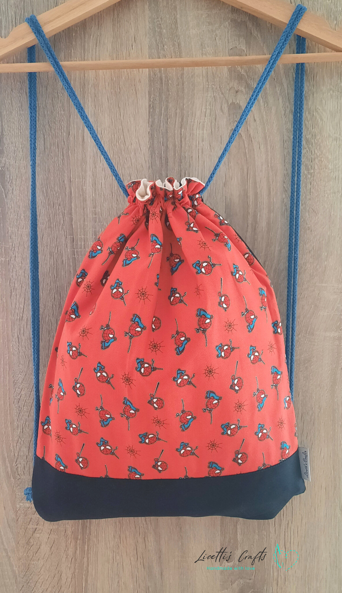 Mochila Spiderman baby hecha a mano en 100% algodón americano con espalda negra