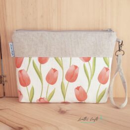 Bolso de mano de tela con estampado de tulipanes y cremallera, clutch artesanal de loneta hecho a mano.