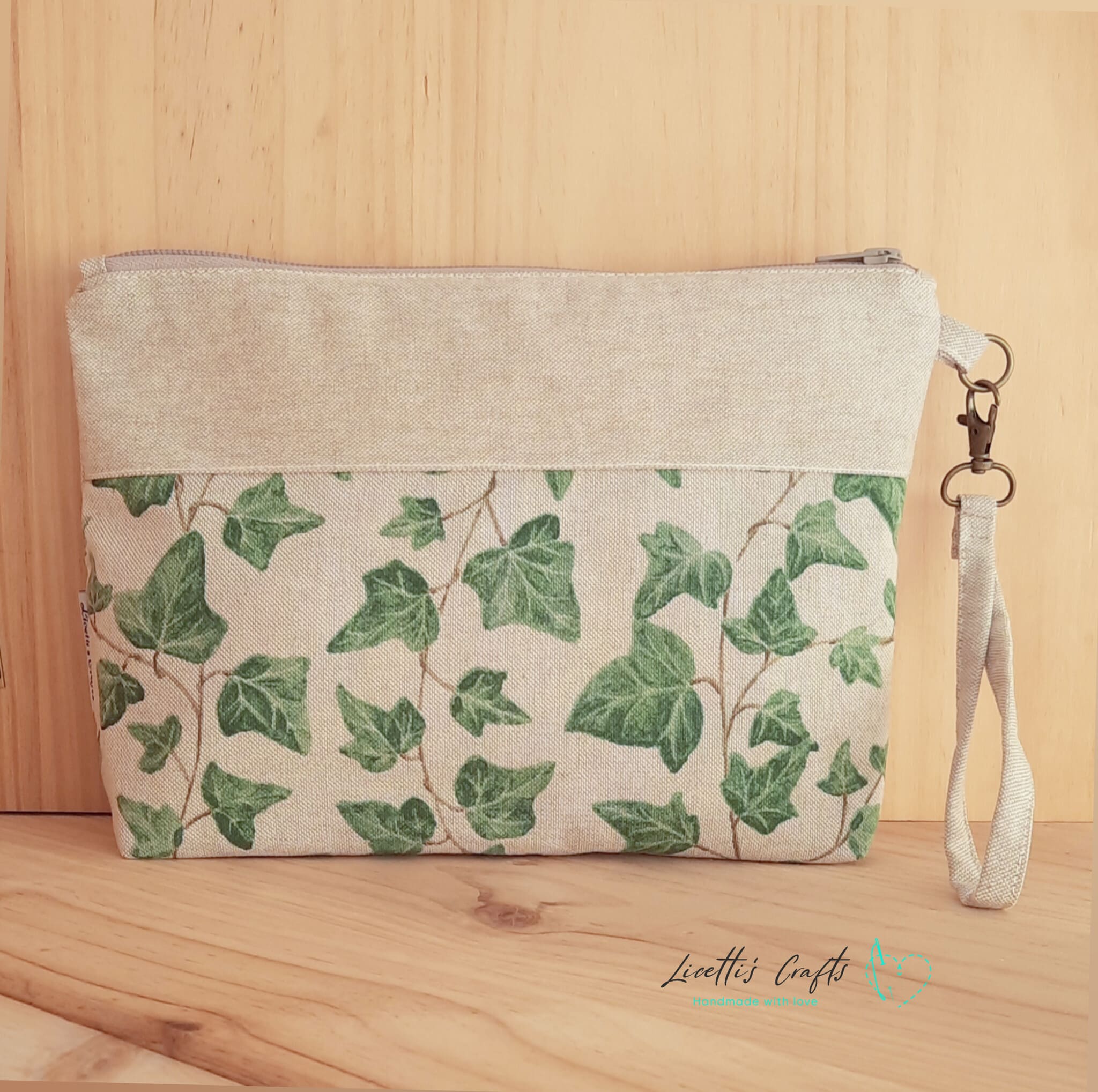 clutch de tela hiedra artesanal con base estructurada